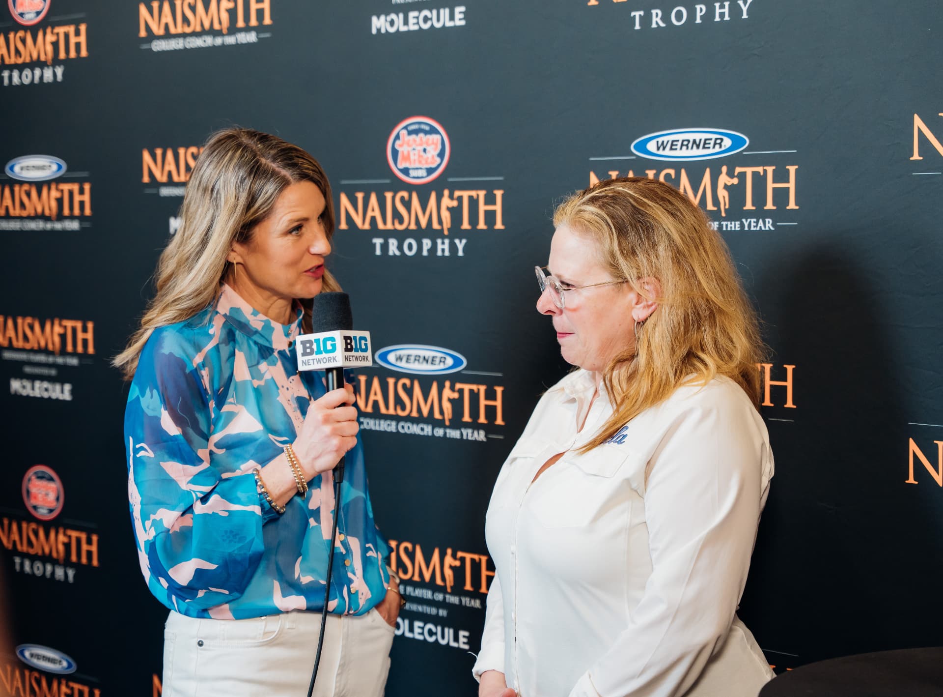 Corporate event photography of a Big Ten Network media interview on the Naismith Trophy step-and-repeat